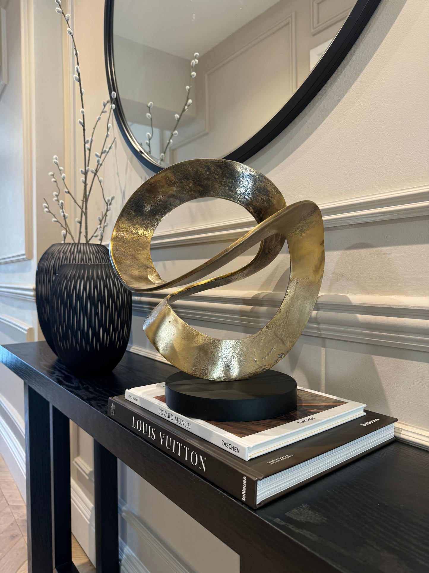 Ribbon Knot Sculpture on Black Wooden Base