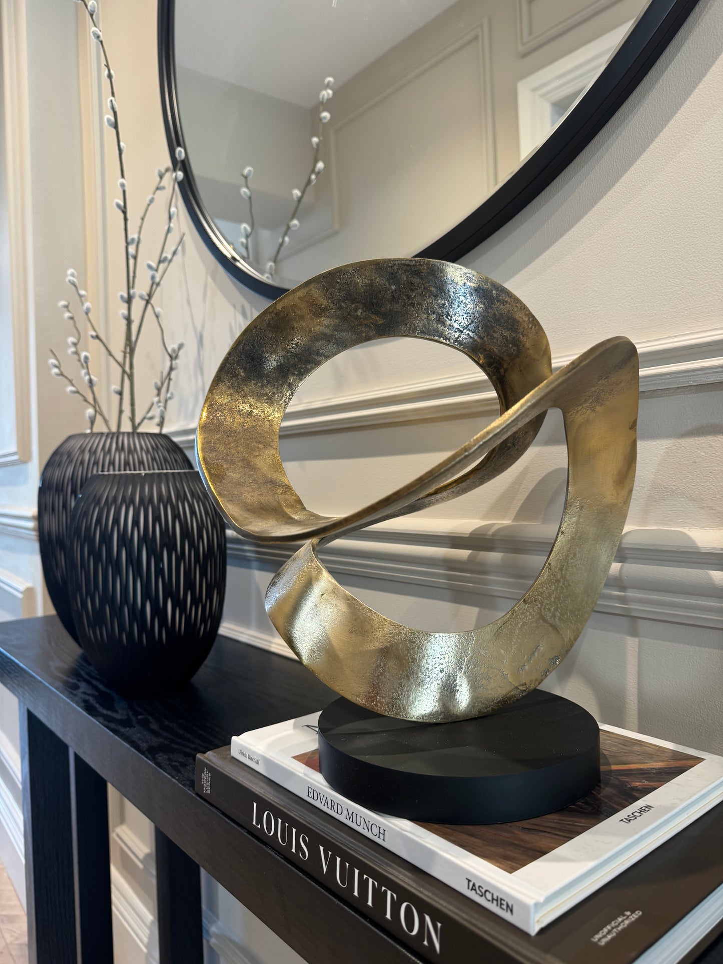 Ribbon Knot Sculpture on Black Wooden Base